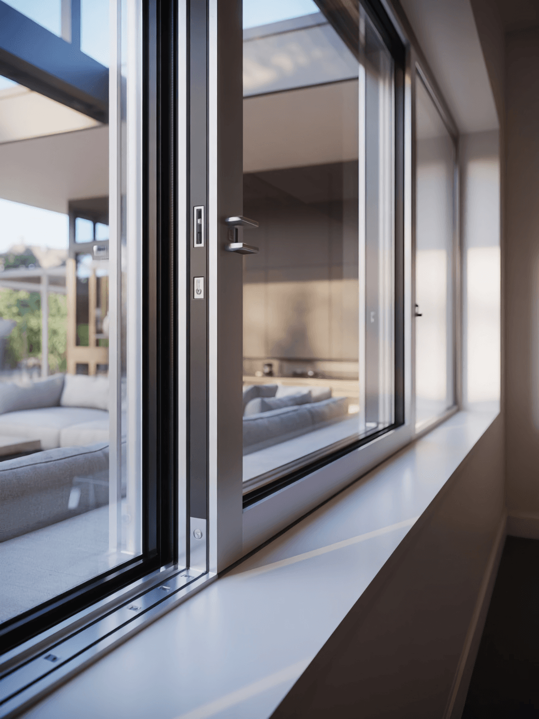 Close-up of contemporary sliding window with slim frame and large glass panels.